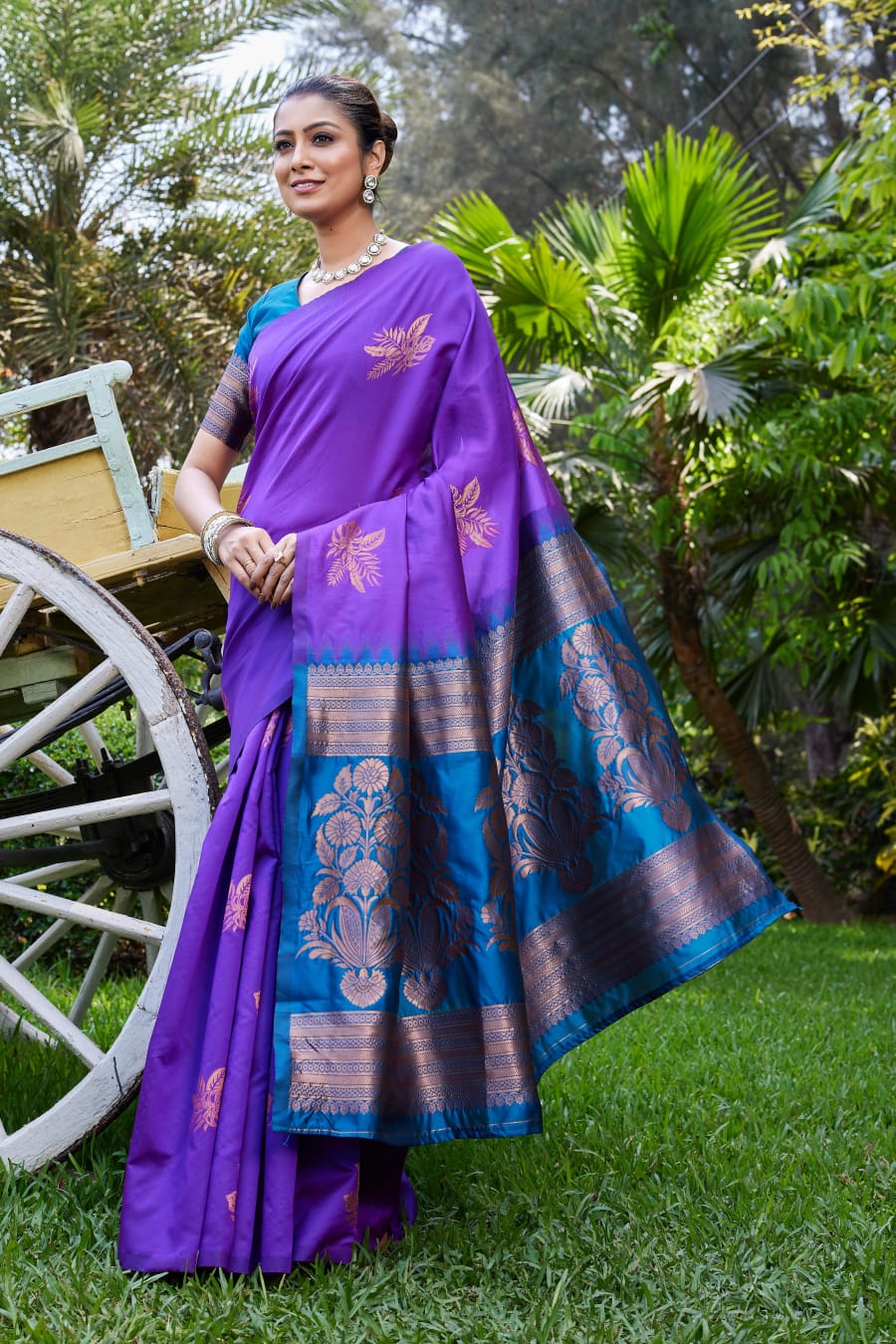 Purple Soft Lichi Silk Saree with Teal Jacquard Border
