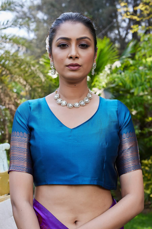 Purple Soft Lichi Silk Saree with Teal Jacquard Border