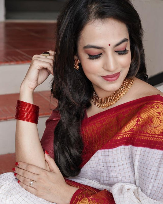 Off White Saree with Red Traditional Border