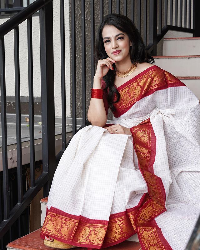 Off White Saree with Red Traditional Border