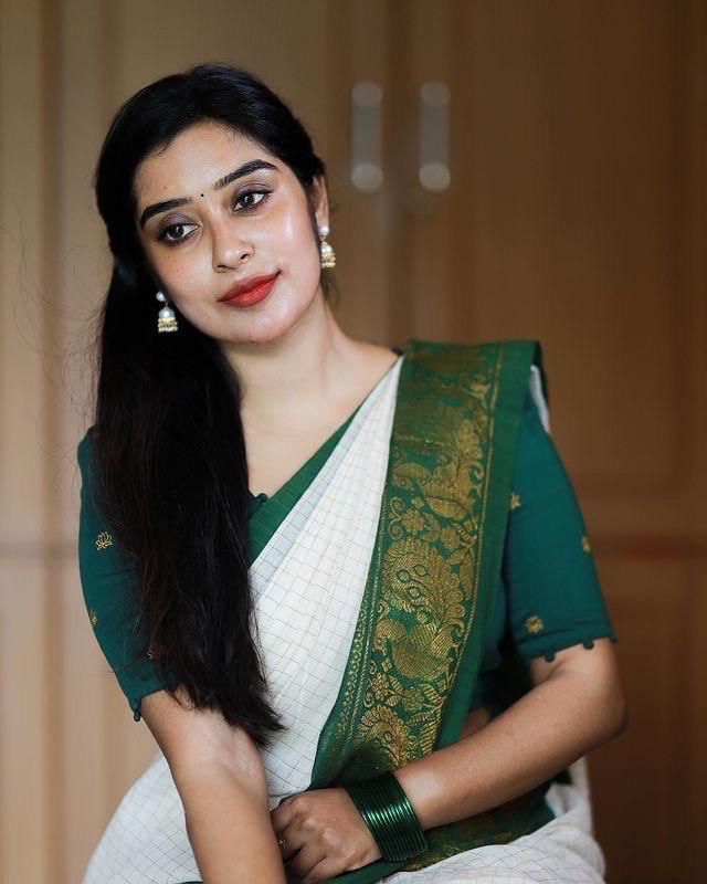 Off White Saree with Green Traditional Border