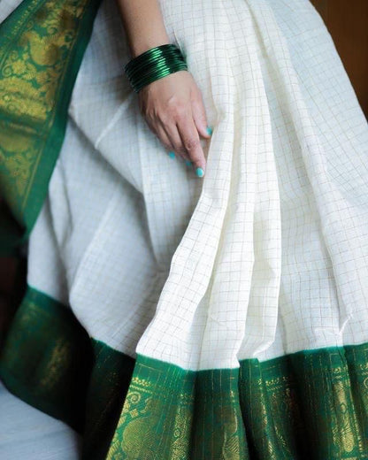 Off White Saree with Green Traditional Border